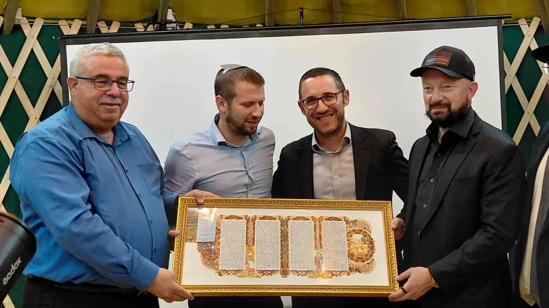 Igor Tulchinsky, right, and Efrat Mayor Dovi Shefler, left, unveil the 'therapy yurt' at the Mondlak Center on 13 November 2025