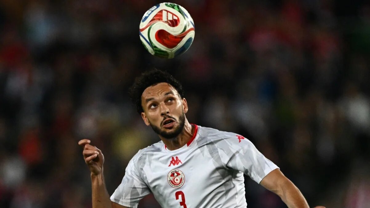 Tunisian defender Montassar Talbi plays the ball during a friendly match against Austria on 1 June 2026 (Joe Klamar/AFP)