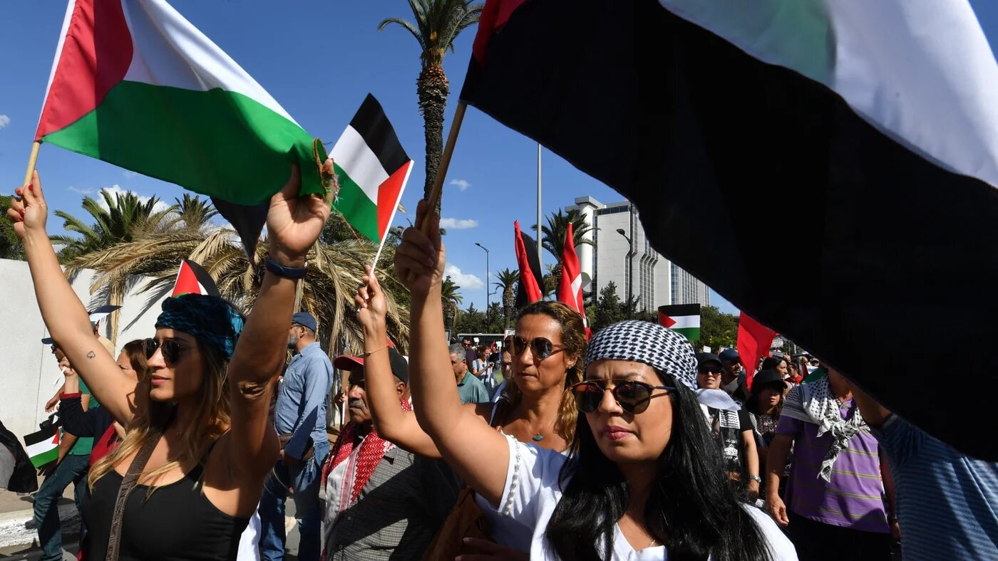 Tunisians rally in the capital Tunis on 21 October 2023 in solidarity with besieged Palestinians being killed in Gaza (Fethi Belaid/AFP)