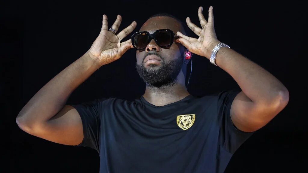 « Je ne peux maintenir ma venue en Tunisie, prévu le 11 août prochain. Je ne sais pas où sont les solutions. Mais cette détresse extrême est insoutenable », a déclaré Gims sur Instagram (AFP/Zakaria Abdelkafi)