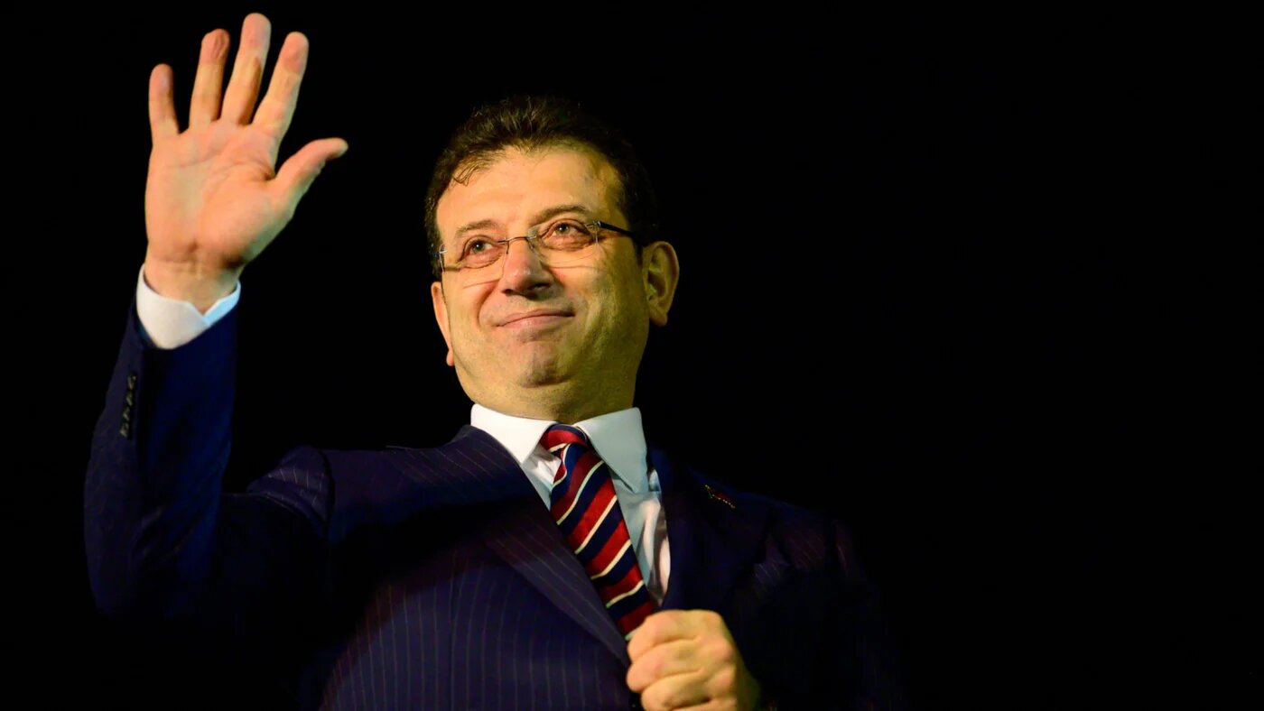 Istanbul Mayor Ekrem Imamoglu greets his supporters in Istanbul in December 2022 (AFP)