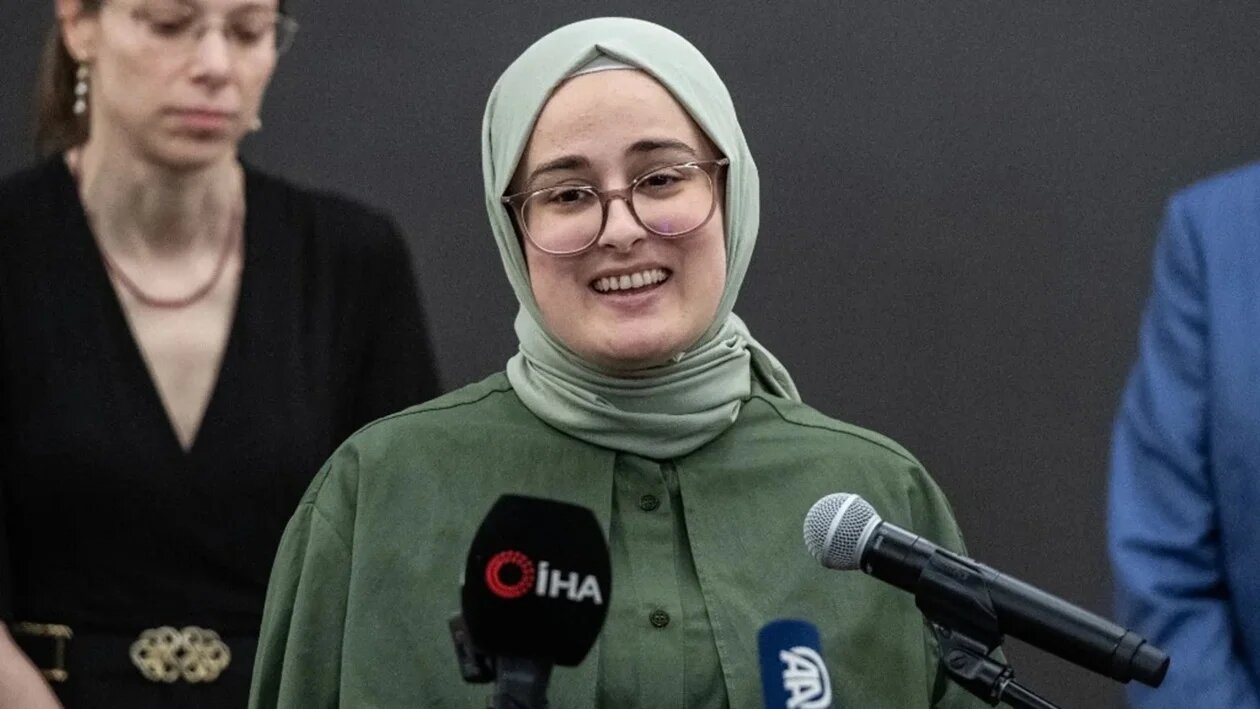 Rumeysa Ozturk speaks at a press conference at Logan International Airport in Boston, Massachusetts, on 10 May 2025 (Joseph Prezioso/AFP)