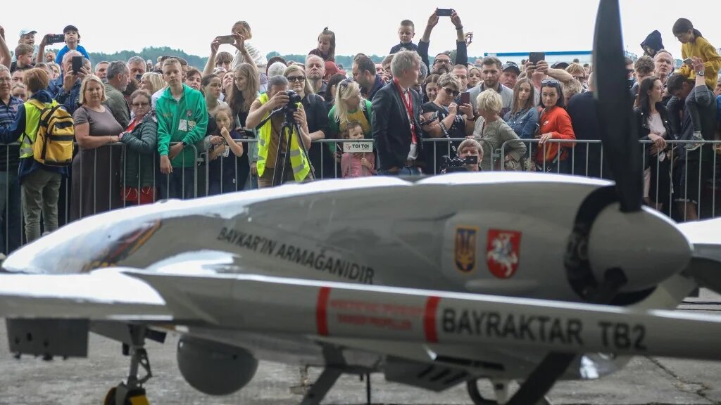 A Turkish Bayraktar TB2 combat drone is on view during a presentation at the Lithuanian Air Force Base in Siauliai, Lithuania, on 6 July 2022 (AFP)