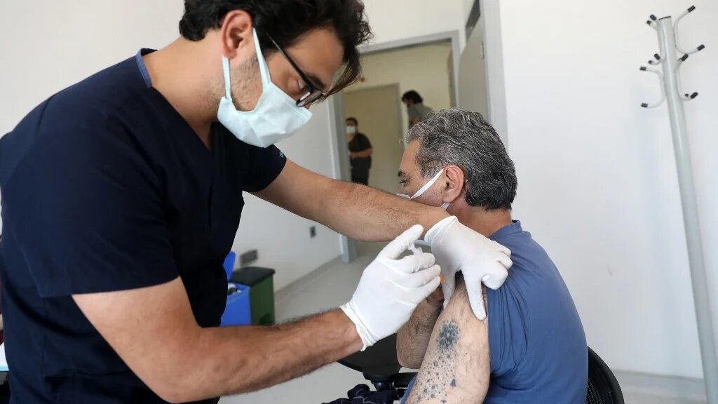 A man receives a dose of Pfizer BioNTech vaccine against Covid-19 in Ankara, Turkey, on 7 June 2021.