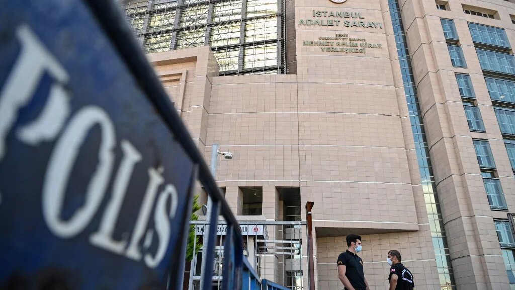 A security guard stands in front of Istanbul's court house on 3 July 2020. (AFP)