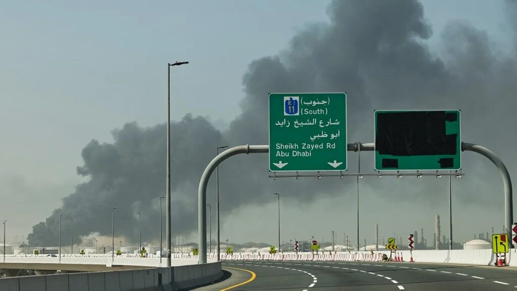 A plume of smoke rises from the port of Jebel Ali following a reported Iranian strike on Dubai on 1 March 2026 (Fadel Senna/AFP)