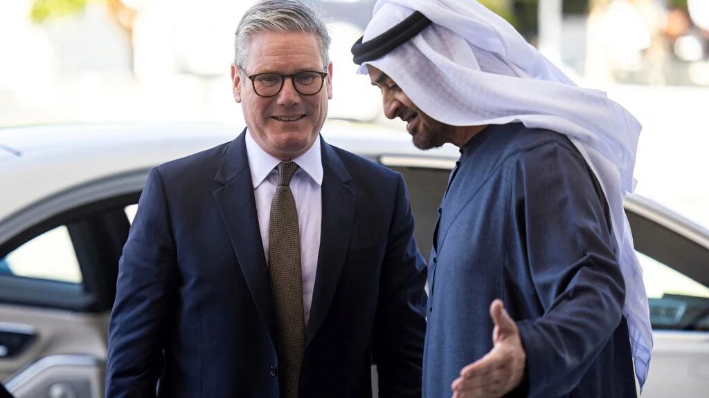 UAE President Mohammed bin Zayed welcomes British Prime Minister Keir Starmer ahead of a meeting at Al-Shati Palace in Abu Dhabi on 9 December 2024 (UAE Presidential Court/AFP)