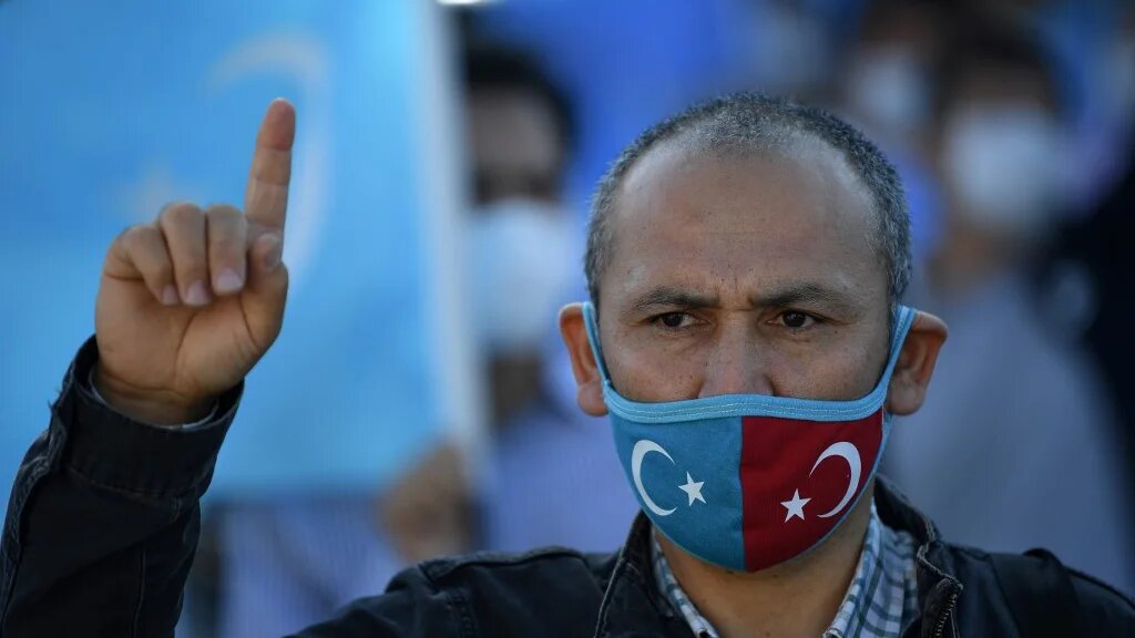 At least one million Uighurs are said to be held in internment camps where they are undergoing political "re-education".