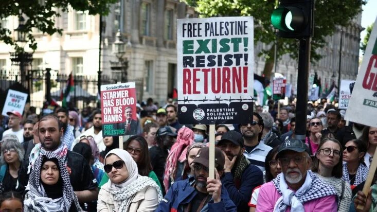Pro-Palestinian supporters gather after a march through central London, commemorating the anniversary of the Nakba, on 17 May 2025 (Henry Nicholls/AFP)