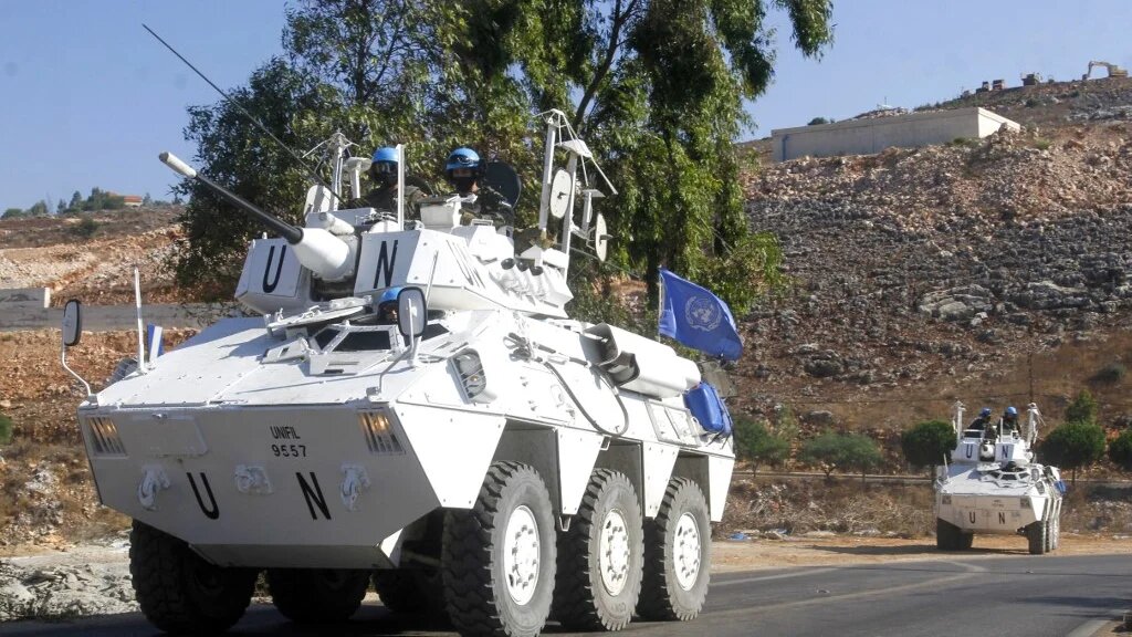 A UN peacekeeping force patrol near the southern Lebanese border with Israel on 26 August.