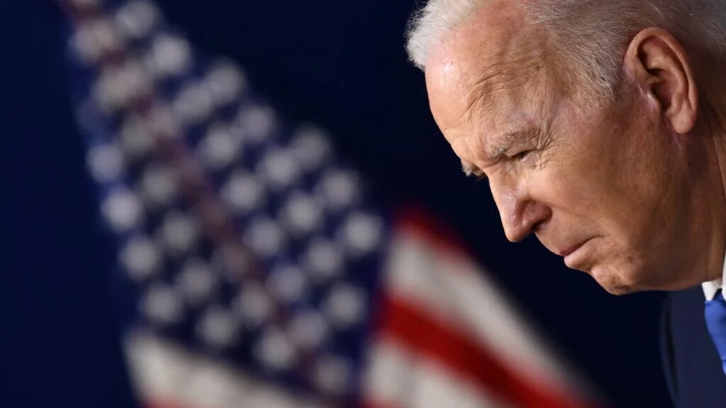 US President Joe Biden speaks in Washington on 14 January 2022 (AFP)