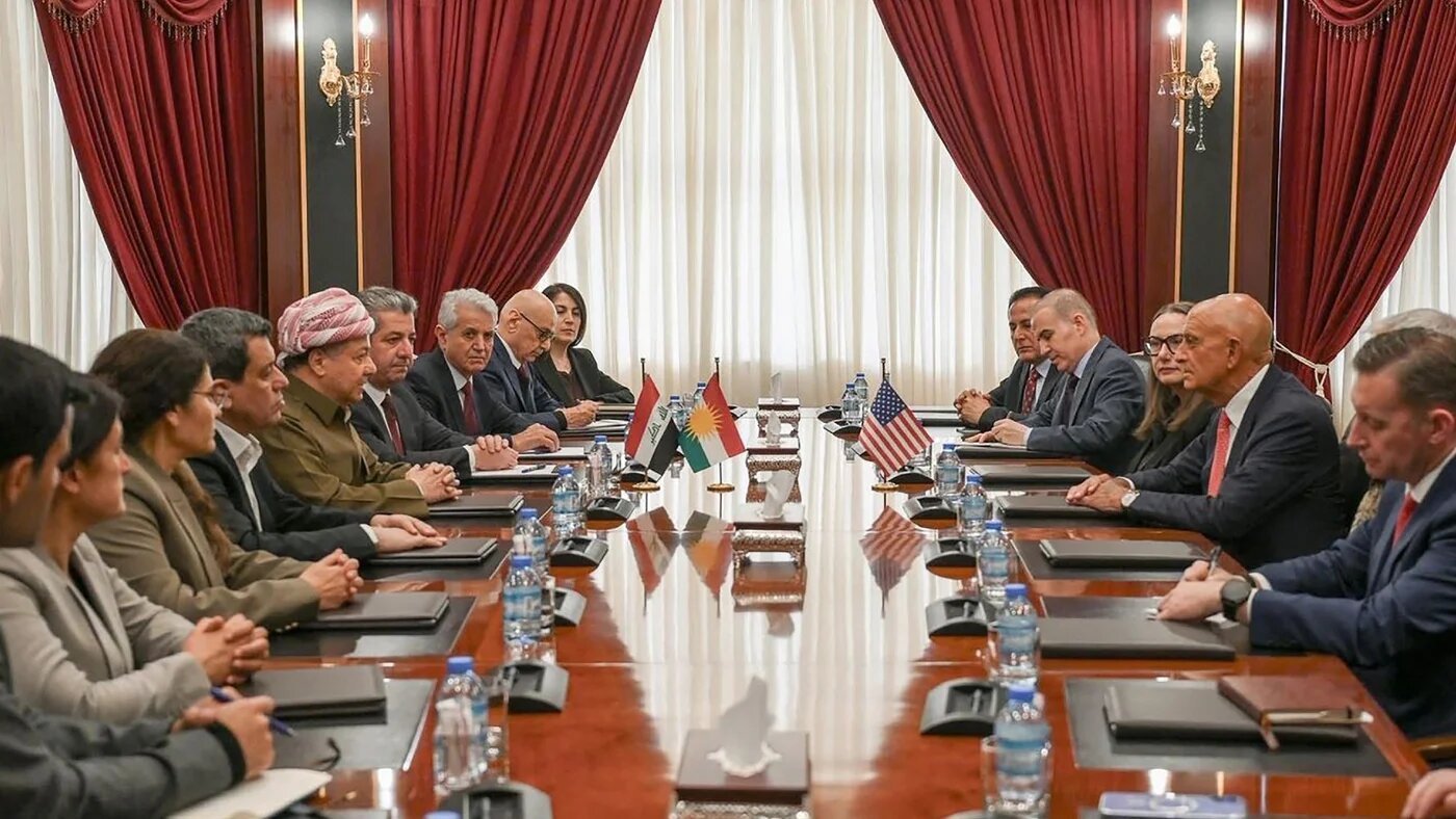 US Special Envoy to Syria Tom Barrack (2nd R) meets the head of the Kurdish-led Syrian Democratic Forces, Mazloum Abdi (4thL) and Kurdish political leader Masoud Barzani (5thL) in Erbil on 17 January 2026 (Handout/Barzani Headquarters/AFP)