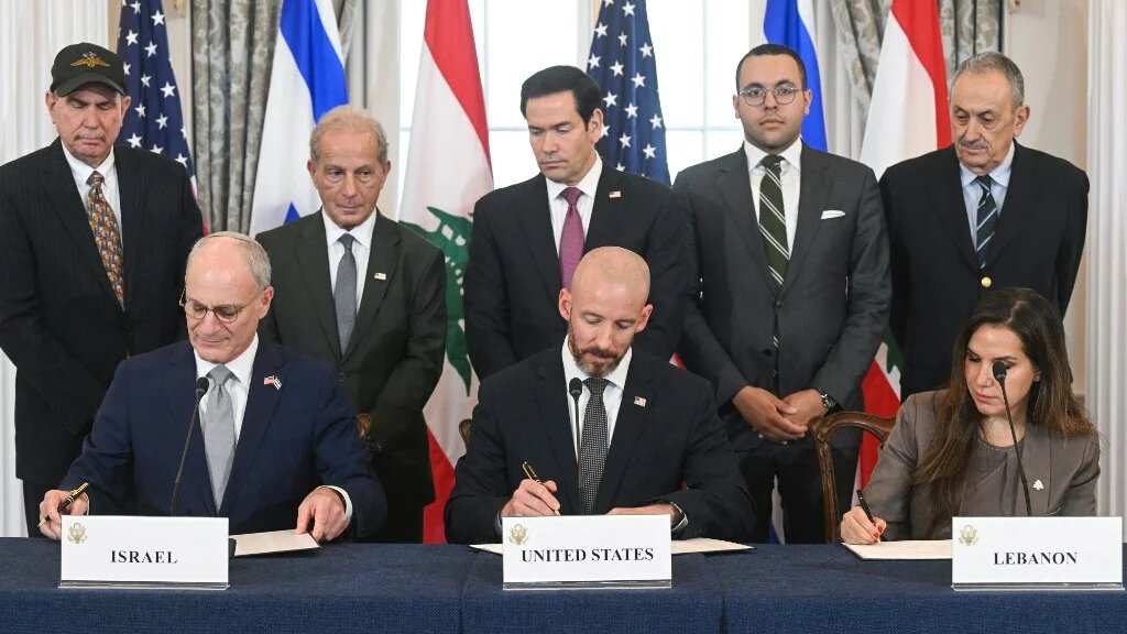 US Secretary of State Marco Rubio (centre of back row) looks on as Israeli, American and Lebanese officials sign a framework agreement in Washington, on 26 June 2026 (Saul Loeb/AFP)