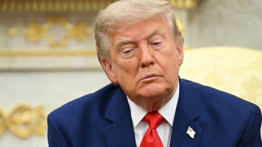 US President Donald Trump is pictured in the Oval Office of the White House in Washington, DC, on 21 July 2026 (Saul Loeb/AFP)