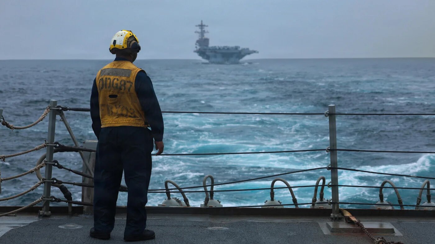 A US Sailor stands on the flight deck of the guided-missile destroyer USS Mason on 4 September 2026 (US Navy/AFP) 