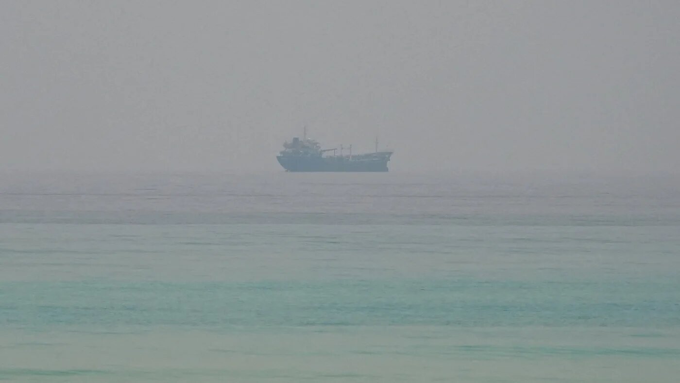 A vessel at the Strait of Hormuz, as seen from Musandam, Oman, on 8 July 2026 (Reuters/Stringer)
