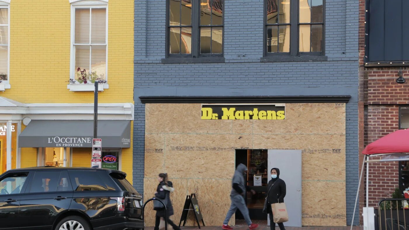 All across the capital of Washington, businesses, restaurants, and stores were boarding up their windows and doors.