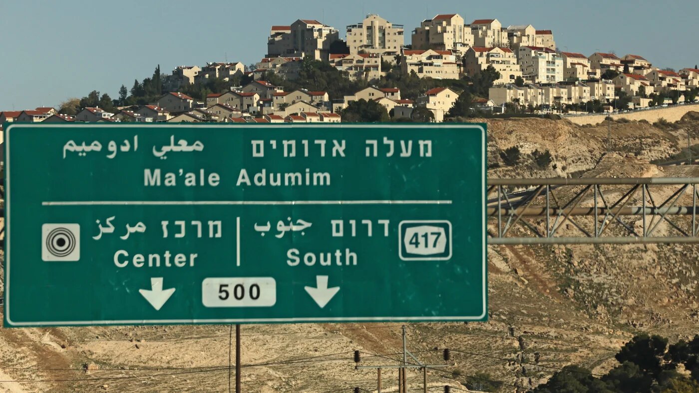 A picture taken from the E1 corridor, a super-sensitive area of the occupied West Bank, shows the Israeli settlement of Maale Adumim in the background on 16 April 2025 (AFP) 