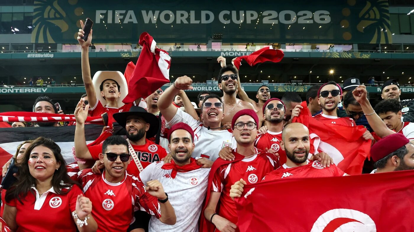 Tunisian fans gesture ahead of the 2026 World Cup Group F match with Sweden at the Monterrey Stadium in Guadalupe on 14 June 2026 (Julio Cesar Aguilar/AFP)