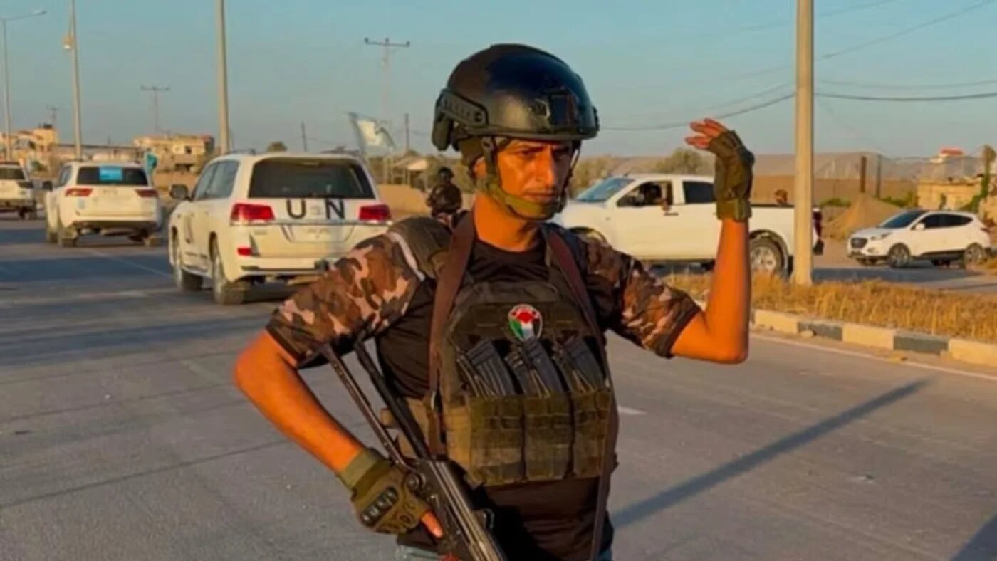 Yasser Abu Shabab holding a gun in an image posted on the Popular Forces social media account (Facebook/Screengrab)
