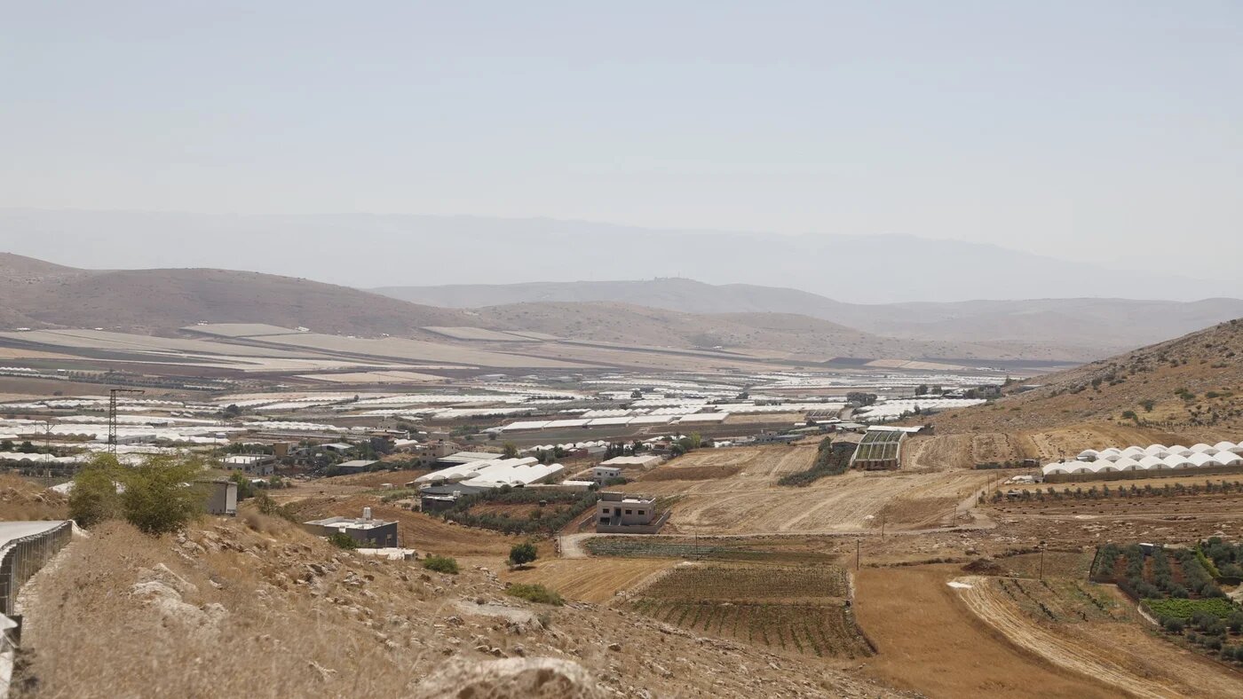 Palestinian farmers in the Jordan Valley have been forced to flee their lands, known as the 'breadbasket of Palestine' as Israel accelerates construction of another separation wall (Muhammad Ateeq/MEE)