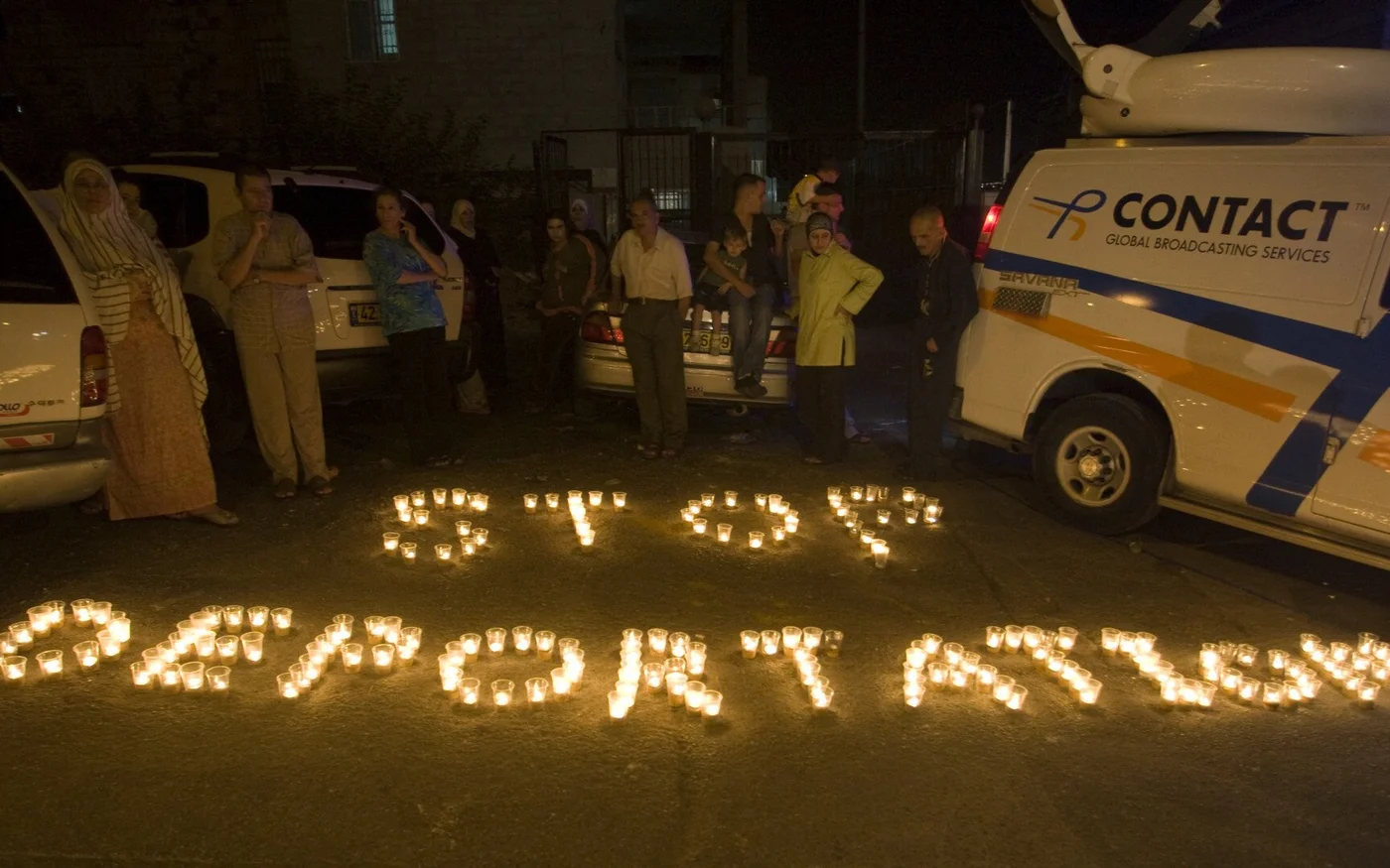 Des Palestiniens manifestent à Jérusalem-Est après l’annonce selon laquelle trois membres du Conseil législatif palestinien appartenant au Hamas allaient perdre leur droit de résidence, le 13 juillet 2010 (AFP)