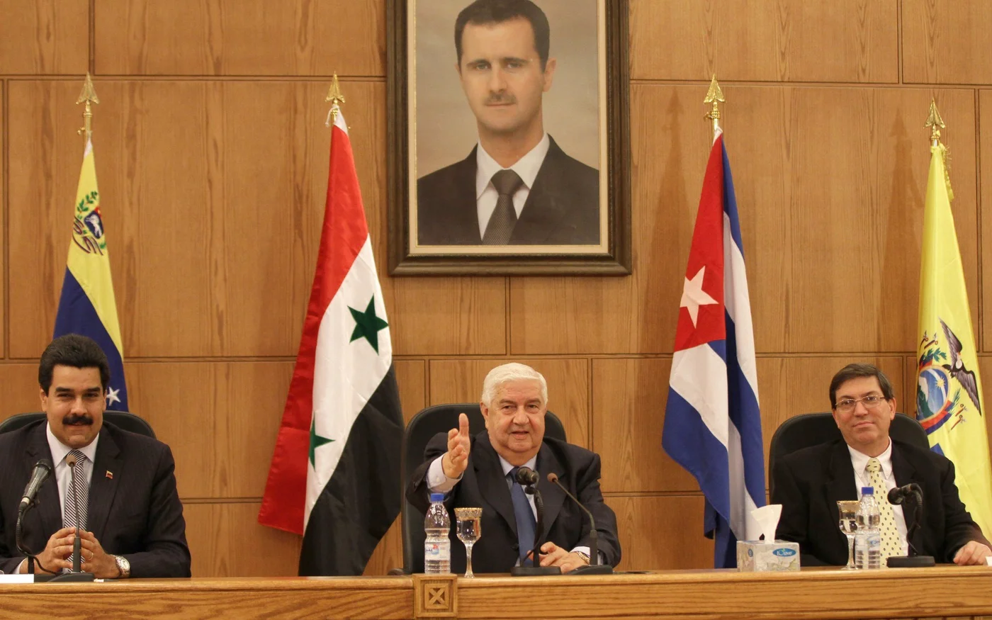 Nicolás Maduro, le ministre syrien des Affaires étrangères Walid Muallem et le ministre cubain des Affaires étrangères Bruno Eduardo Rodríguez Parrilla à Damas, en 2011 (AFP)