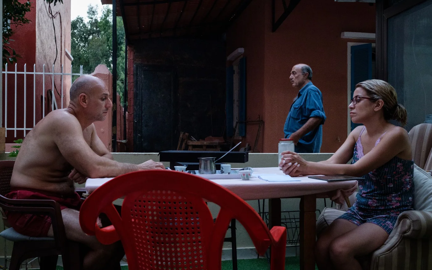 Pascale et son mari Michel sur la terrasse de sa mère à Karantina (MEE/Rita Kabalan)