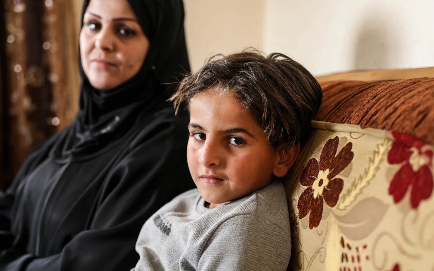 Fearing her son Ameer's anxiety might worsen, Gharqoud now teaches him at home. March 2021 (Mohammed A. Alhajjar)