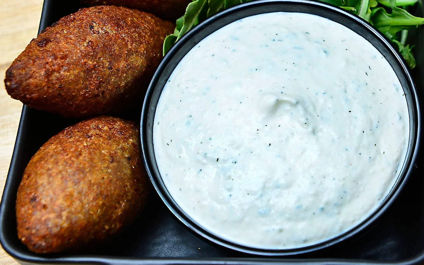 Les kibbeh, plat libanais traditionnel à base de bœuf haché, d’herbes et d’oignons caramélisés, sont populaires au Brésil (Reuters)