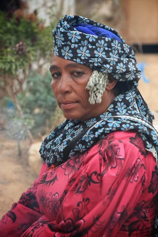 Najat Saif says her family has survived thanks to the generosity of other Yemenis sharing aid donations with her (MEE/Khalid al-Banna)