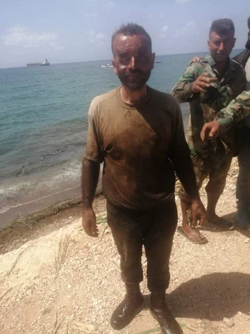 oil baniyas man
