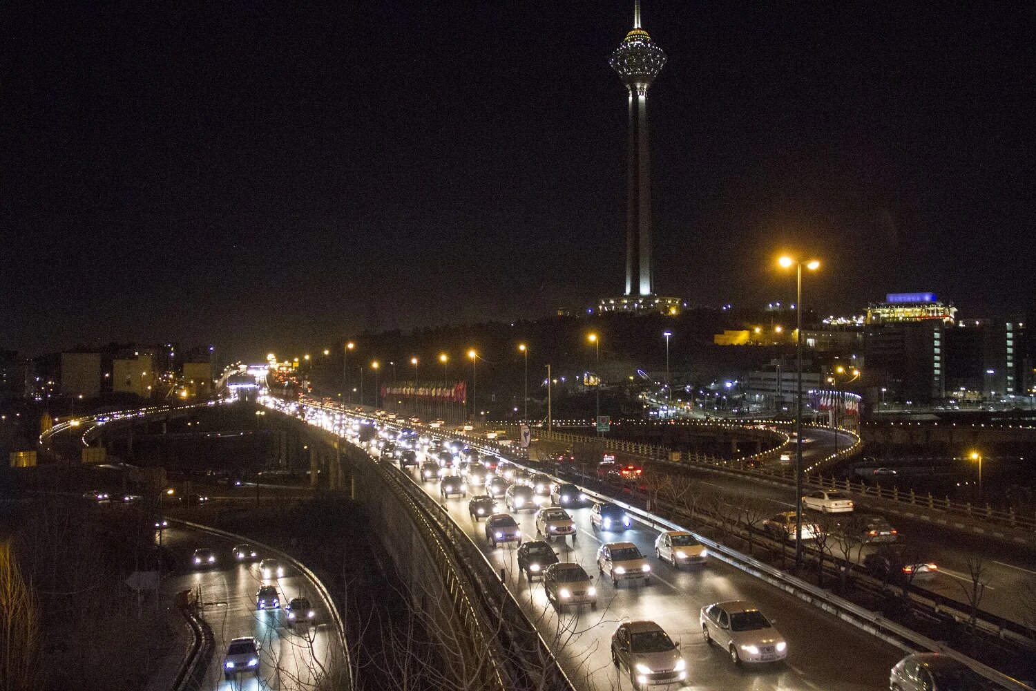 Tehran’s massive traffic jams also bring their own freedom for teenagers and twenty-somethings. Sima and Shahram (not their real names) are a young couple who study art at university and wait tables in cafes. For fun they aimlessly drive around in Shahram’s father’s car while swigging Aragh Sagi (literally translated as "doggy distillate"), a vodka-like moonshine, that sells in plastic bottles for $9.60 per litre. (MEE) 