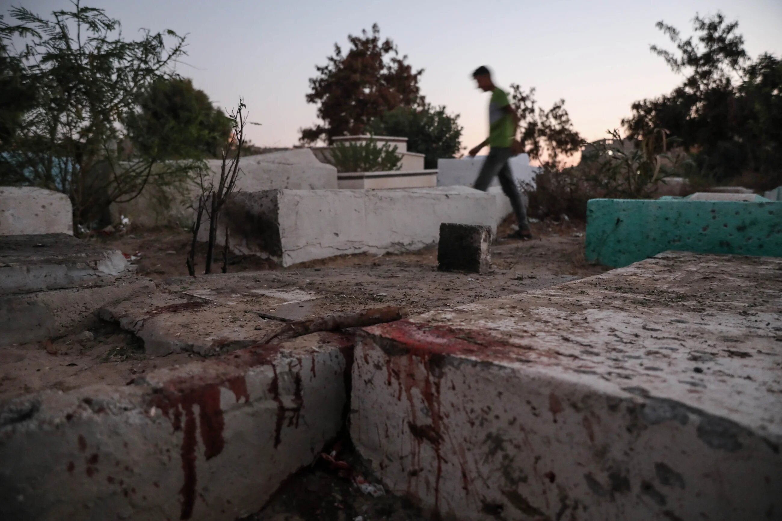 The blood stains of five children killed by a suspected Israeli air strike inside Falluja cemetery in the northern Gaza Strip on 7 August 2022 (MEE/Mohammed al-Hajjar)