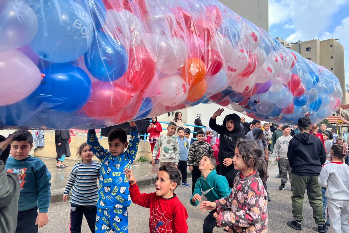 Displaced children from southern Lebanon take part in recreational activities organised by the scouting movement to celebrate Eid al-Fitr, at a shelter school in Sidon (Mahmoud Zayyat/AFP)