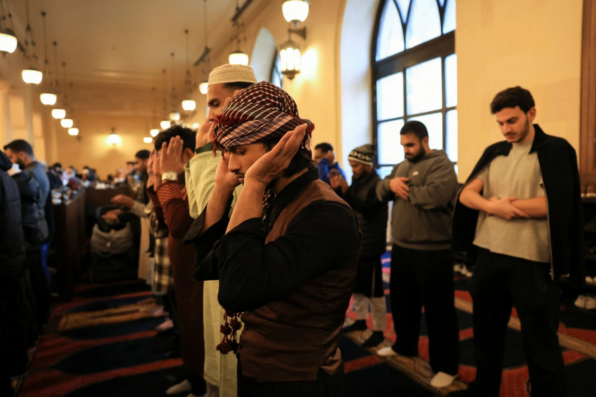 Worshippers attend Eid al-Fitr prayers at the Mohammad Al Amin Mosque in Beirut (Raghed Waked/Reuters)