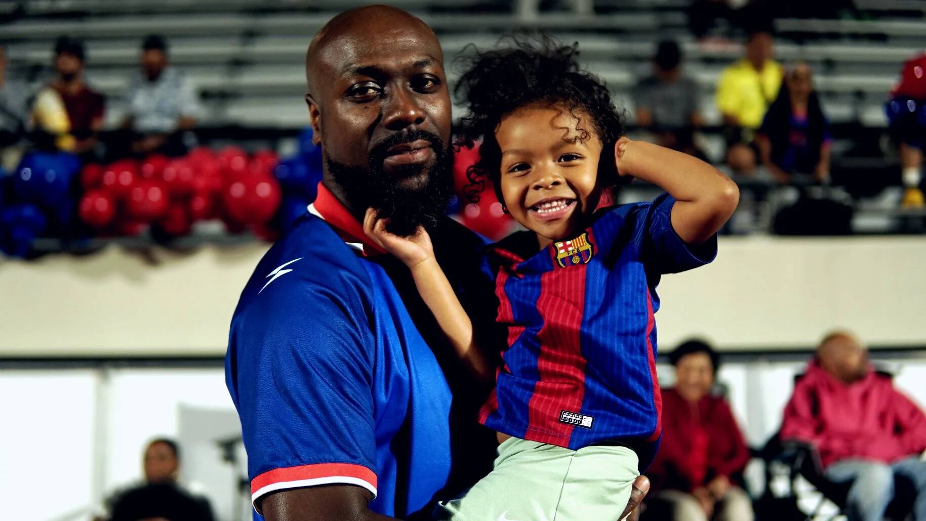 Darrell Etienne, brother of Haitian forward Derek Etienne Jr, attends a watch party in Paterson in honour of the Haitian community in the town (Azad Essa/MEE)