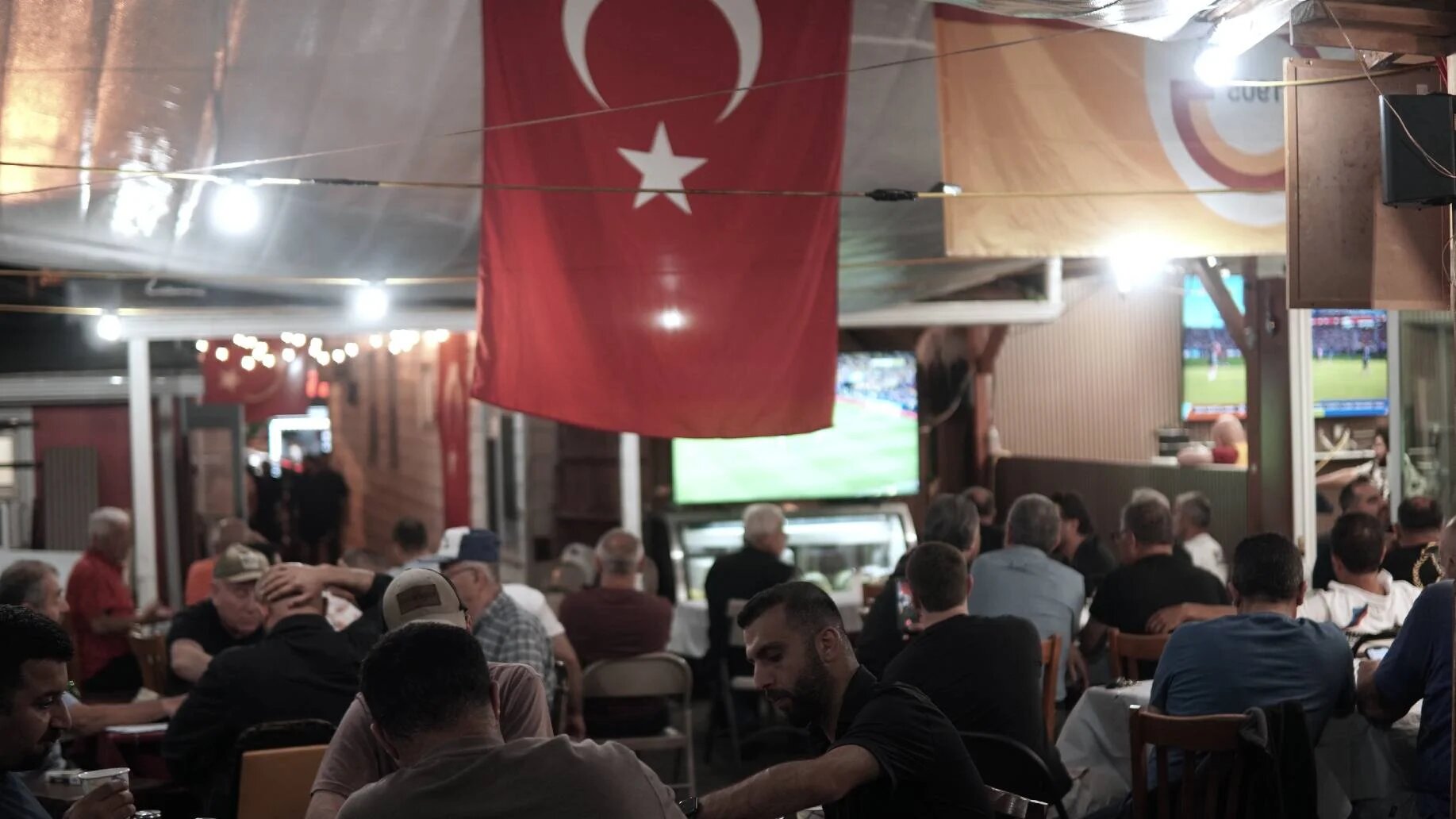 In towns like Paterson, New Jersey, the tournament has brought cafés to life on the weekend as they turn into community hubs (Azad Essa/MEE)