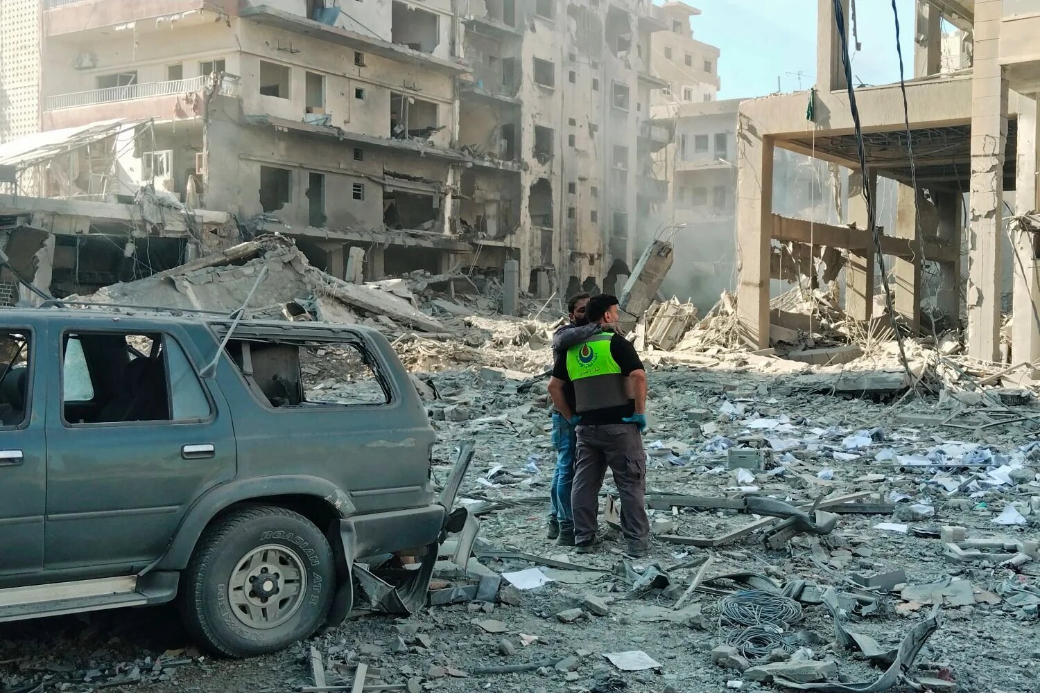 Civil defence workers inspect site of Israeli strike in Tyre, southern Lebanon, 31 May 2026 (Kawant Haju/AFP)