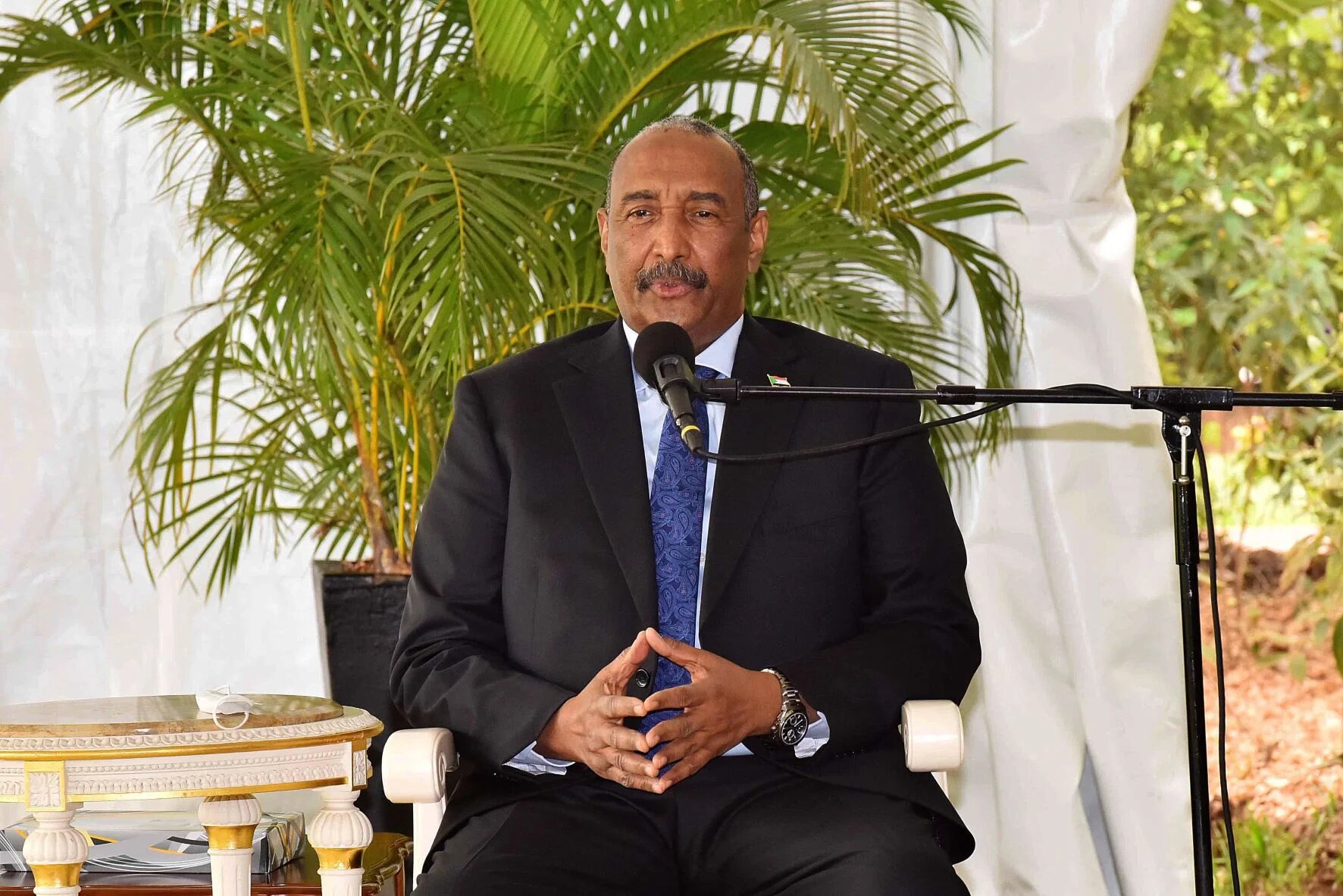 General Abdel Fattah al-Burhan during talks with Ugandan President Yoweri Museveni (not pictured) at the State House, Entebbe, on 17 March 2022 (AFP)