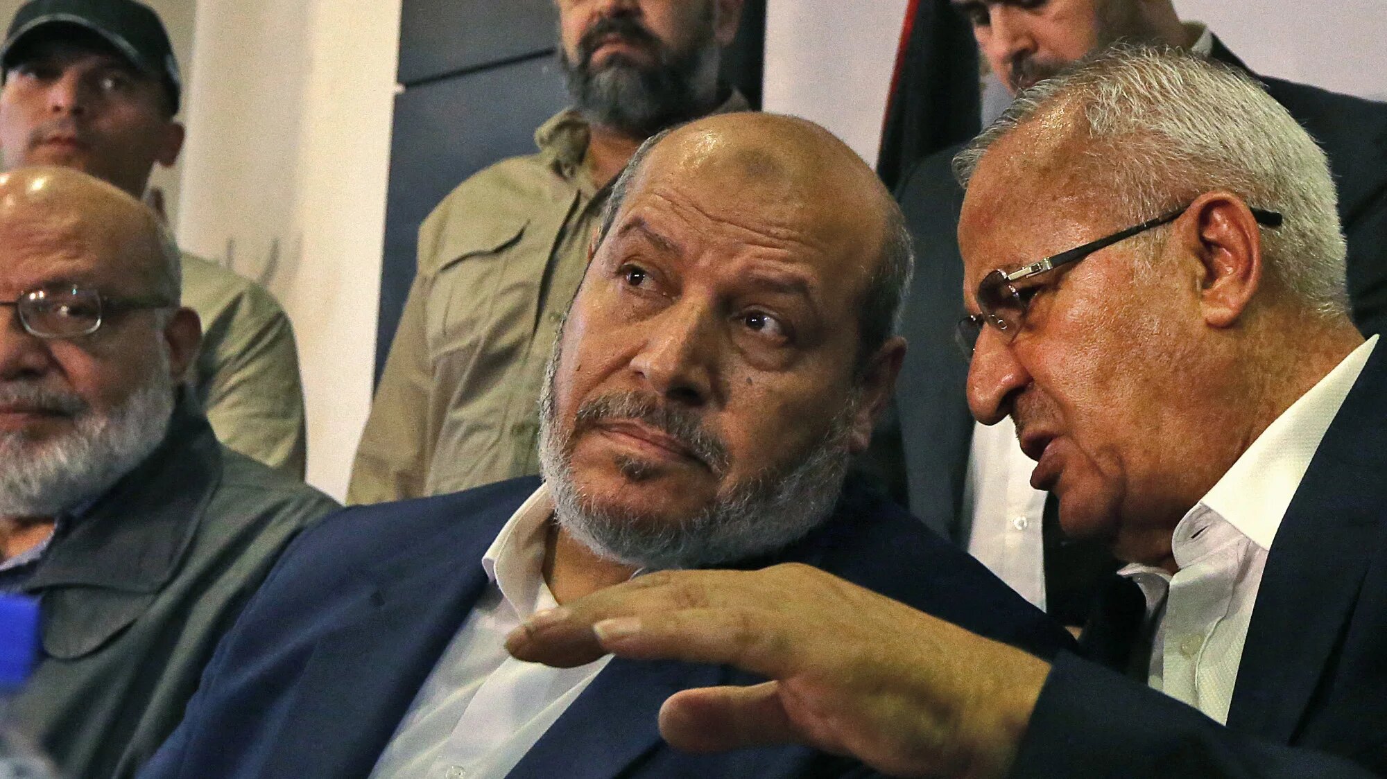 Hamas Gaza chief Khalil al-Hayya (C) during a press conference during a visit to the Syrian capital Damascus on 19 October 2022 (AFP/Louai Beshara)