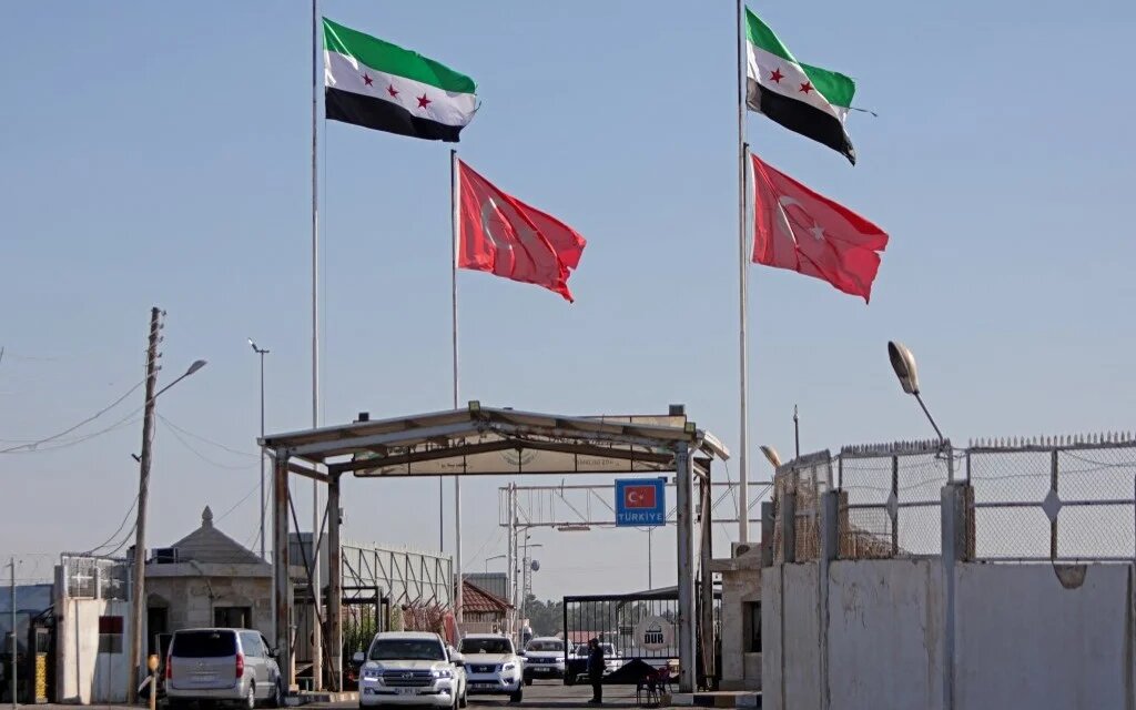 A convoy transporting a delegation of US representatives arrives through Syria's Bab al-Salama crossing with Turkey as part of their visit to the rebel-held areas of Aleppo province, on 27 August 2023.