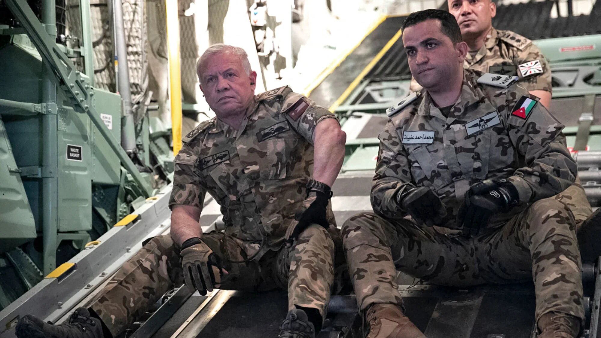 Jordan’s King Abdullah II aboard a military aircraft during an aid drop over southern Gaza, 27 February 2024 (AFP via Jordan Public Security)