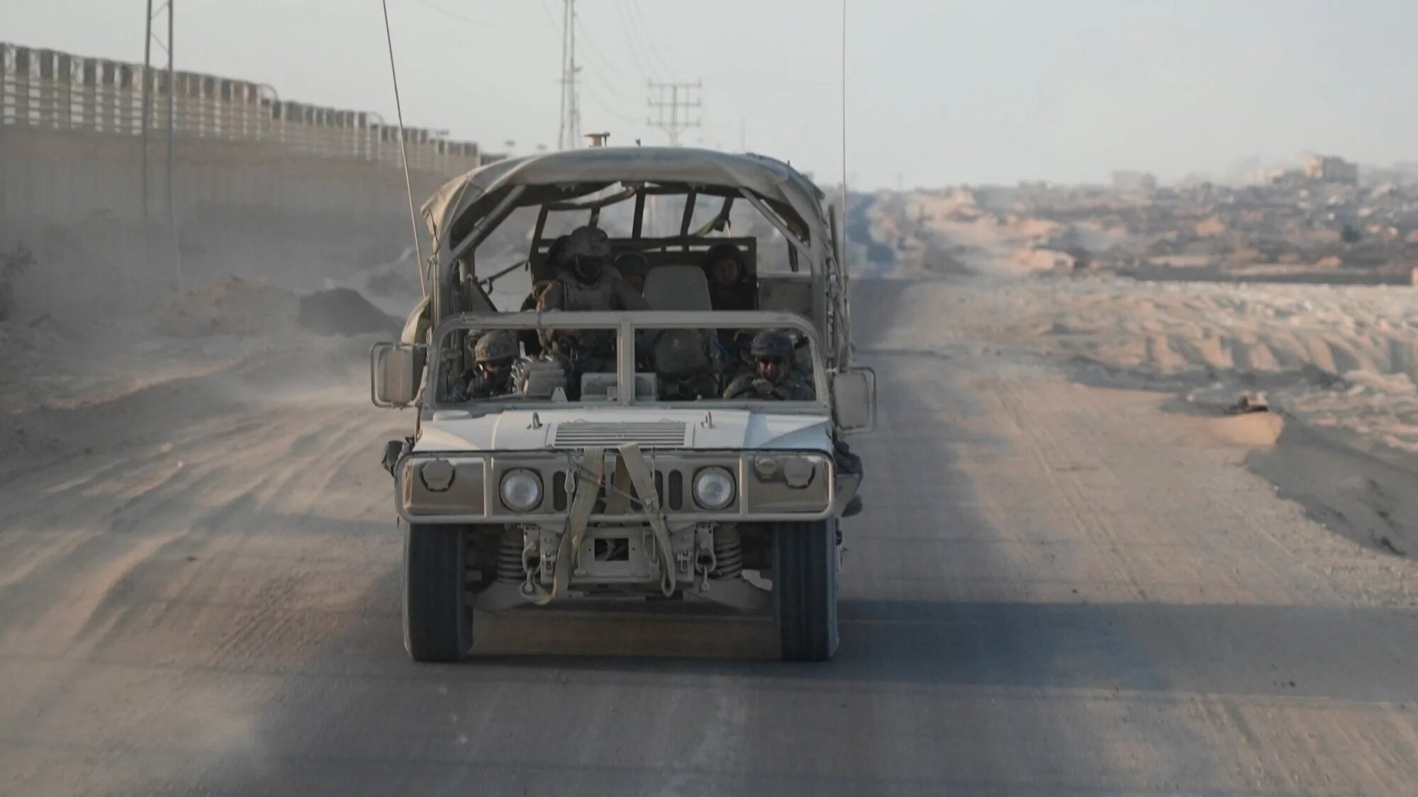 Israeli soldiers patrol along the Philadelphi corridor in Rafah in the Gaza Strip on 13 September 2024 (AFP/Sharon Aronowicz)