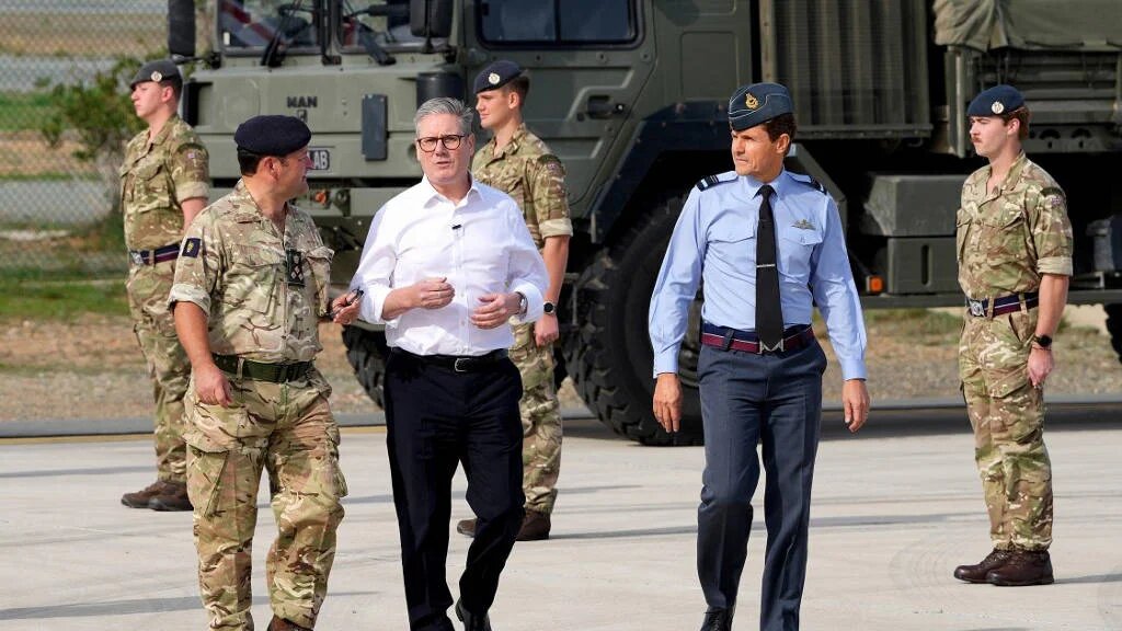 Britain's Prime Minister Keir Starmer arrives at the RAF base in Akrotiri on the southern coast of Cyprus on December 10, 2024.