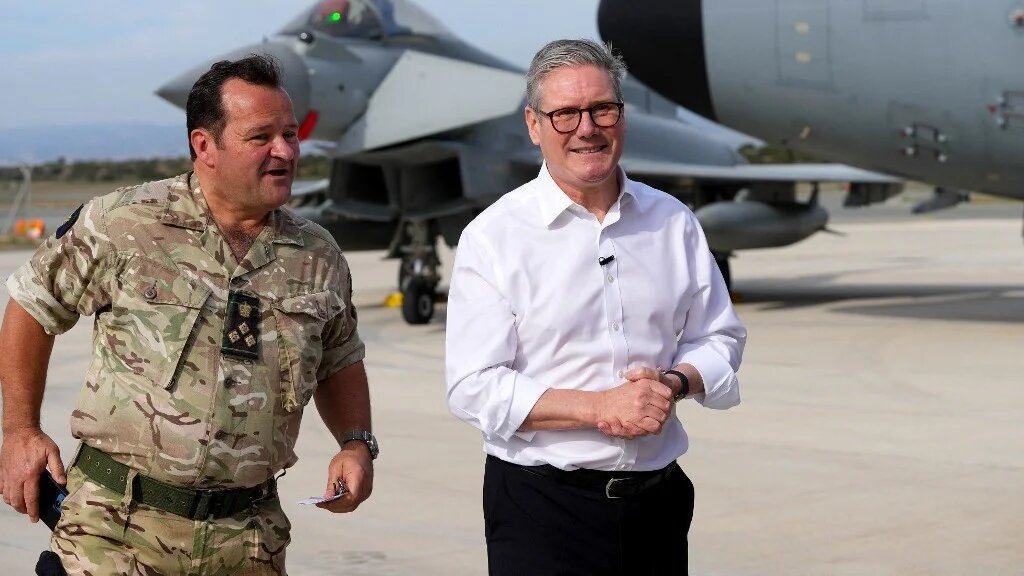 Britain's Prime Minister Keir Starmer arrives at the RAF base in Akrotiri on the southern coast of Cyprus on December 10, 2024.