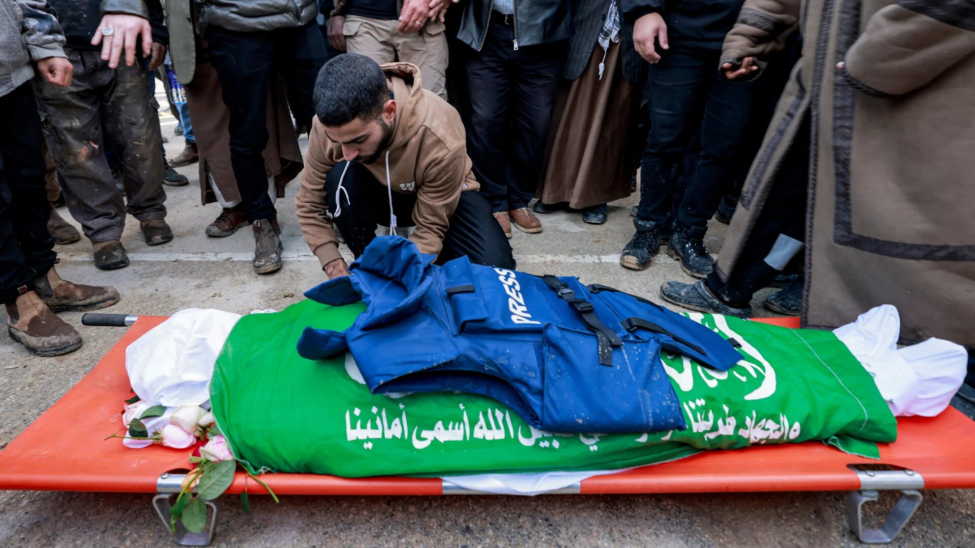 A relative mourns Shatha al-Sabbagh, a 21-year-old Palestinian journalist killed overnight by Palestinian security forces, during her funeral in Jenin in the north of the occupied West Bank on 29 December 2024 (Jaafar Ashtiyeh/AFP)_