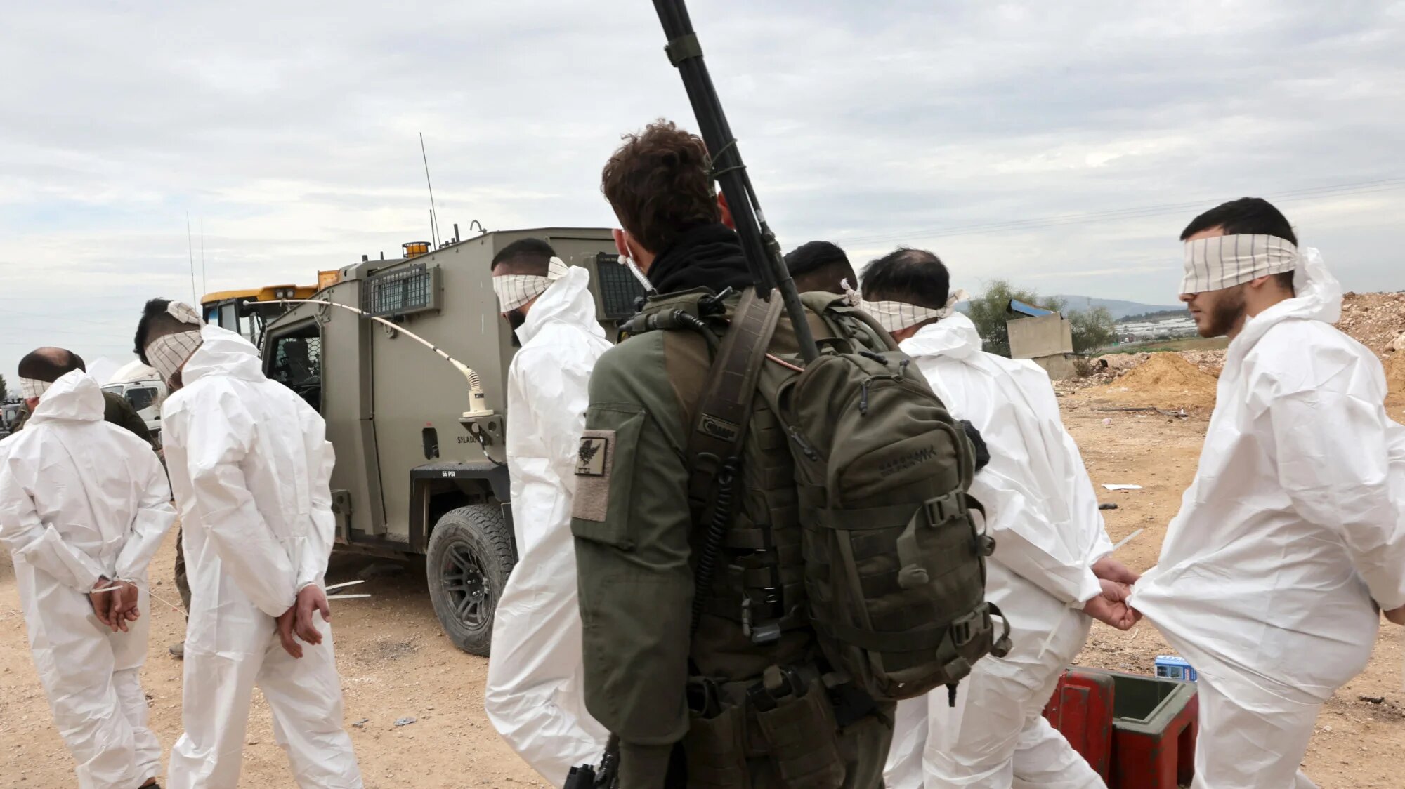 An Israeli soldier during the arrest of Palestinians from Jenin in the occupied West Bank on 22 January 2025 (AFP/Gil Cohen-Magen)
