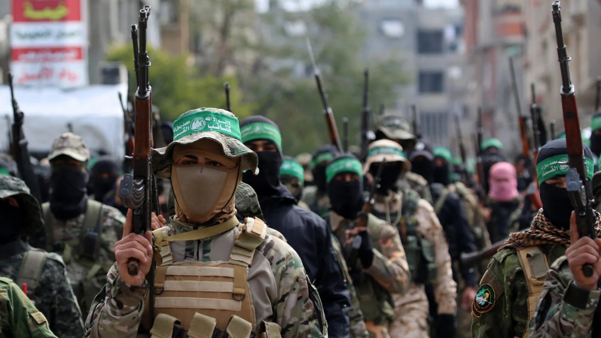Palestinian fighters from the Ezzedine al-Qassam Brigades, the armed wing of Hamas, take part in the funeral procession of Marwan Issa, a top Hamas commander killed in March 2024 on 7 February 2025 (AFP/Eyad Baba)
