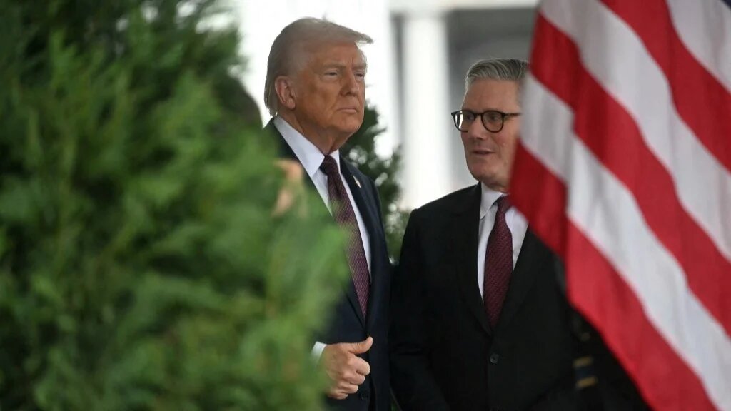 US President Donald Trump greets British Prime Minister Keir Starmer at the entrance of the West Wing of the White House in Washington, DC, on February 27, 2025
